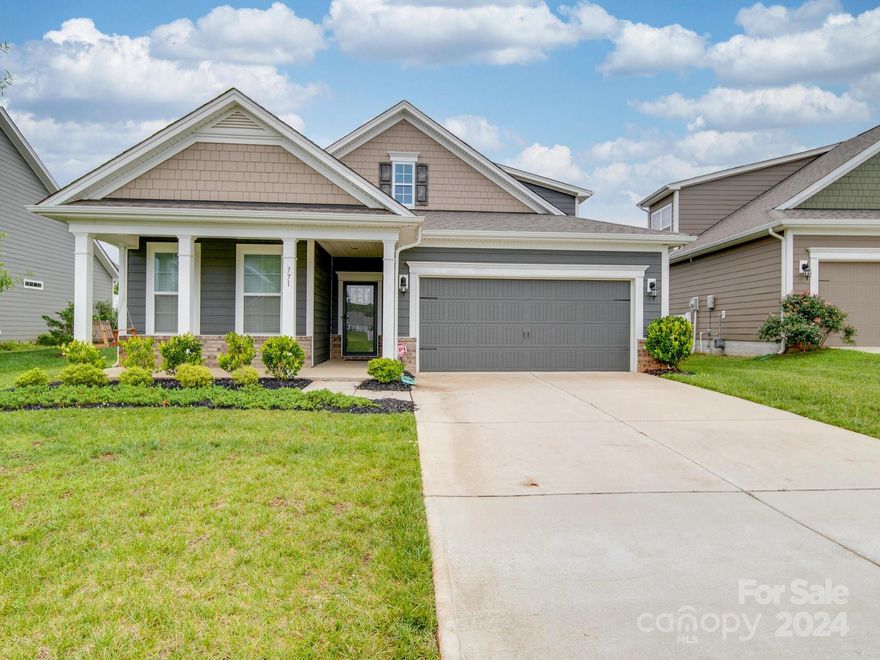 Step inside this incredibly rare 1.5 story located in desirable Cypress Point. This stunning split-bedroom floorplan has granite, and crown molding throughout. Prefinished hardwood flooring flows through the main living space, with carpet in the sizable bedrooms. An open layout perfect for entertaining. Kitchen is equipped with ample cabinet & counter space, pantry, gas range, and beautiful kitchen island that flows into the breakfast area and the living room. Fall in love with the primary suite located on the main floor with tray ceilings, dual vanities, large tile shower, and oversized closet. Additional bedroom and full bath are located on the main floor, as well as a designated office with glass French doors that also doubles as the 3rd bedroom. Travel upstairs to the sizable loft, bedroom, & full bathroom. Open backyard filled with possibilities. Ample amount of Community Amenities, Close proximity to Charlotte, shopping and dining. Award-Winning schools and Low SC taxes!