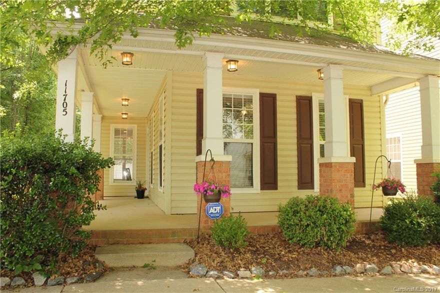 Welcome Home to this adorable home with large semi-wrap around porch for greeting guests in true NC style!  Porch invites you to come and sit a spell. Foyer is flanked with a spacious Great Room with gas FP to the left and a large dining area to the right.  Large windows fill the home with light.   Large master suite on 2nd level with huge walk-in closet.  Freshly painted in today's designer colors. Home features custom molding package and upgraded carpet on second level.  Large level backyard.