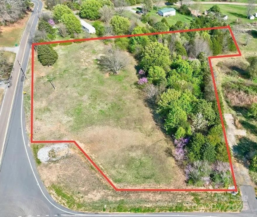 Beautiful level corner lot! Cleared and ready to add your home! Some wooded areas on side and back of property. Property comes with well & septic which saves buyer(s) lots of money! County Water is also available. Septic was inspected in 2024, it allows for up to 4 bedroom home. Great lot to build your dream home! Manufactured/Modular is allowed! Lot is large enough for 2 homes. Lot is less than a mile of I-85! BA Please Text Agent PRIOR to going onto property, Thank you.