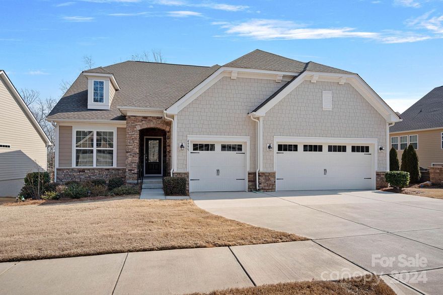 This kind of home doesn’t come up for sale in Tree Tops very often! A ranch with an unfinished basement & three-car garage. At the center of the open floor plan is the Great Room and a beautiful kitchen w/ large island, undercabinet lighting, gas cooktop, and double ovens. You'll also find a dining room, breakfast area, and an office/living room.  Primary suite has wood floors & a spacious bathroom. Two additional bedrooms share a full bathroom. Unfinished basement is pre-plumbed for a kitchen and bath offering great storage or it can be finished for more heated living space. Screened-in porch off the main level, extended paver patio with a built-in grill in the backyard. Gated community with low SC taxes, close to shopping, restaurants & more! Neighborhood clubhouse, outdoor pool, pickleball and tennis courts, walking trails, dog park, kayak launch & lake access. Plus, there are several cabins with activities for everyone including arts and crafts, games & fitness center.