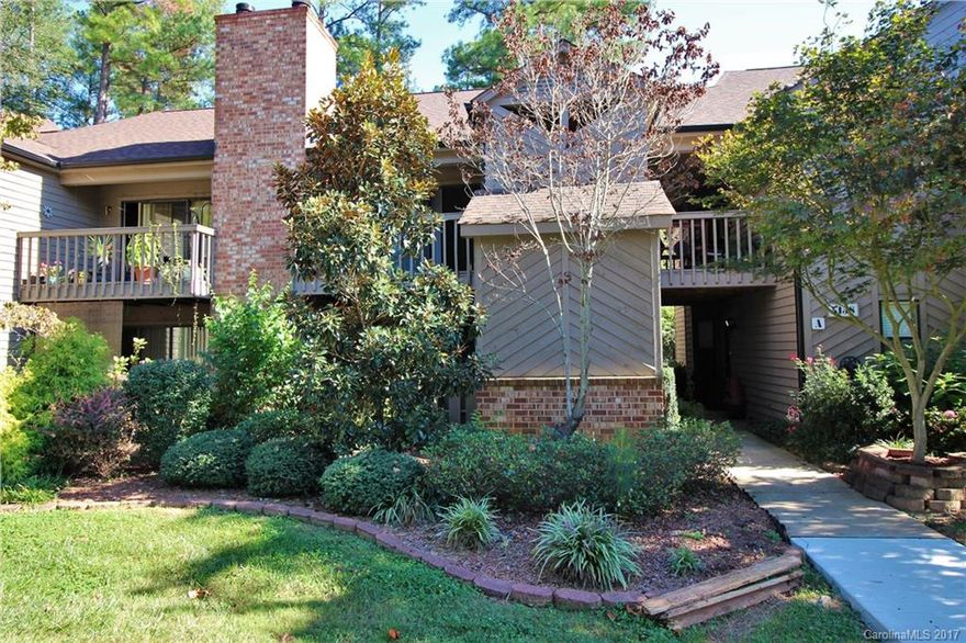 Welcome to Lake Wylie Woods in Lake Wylie, SC. One of Lake Wylie's established condo communities. Enjoy your own private space and be close to all the amenities of the surrounding areas. This condo features wood burning fireplace, granite counters in the kitchen and bath. New paint throughout. Two decks and outside storage. Community sidewalks and pool. Drop off and pick up boat slip for owners in the community. Close to dining and shopping. Award winning Clover schools.