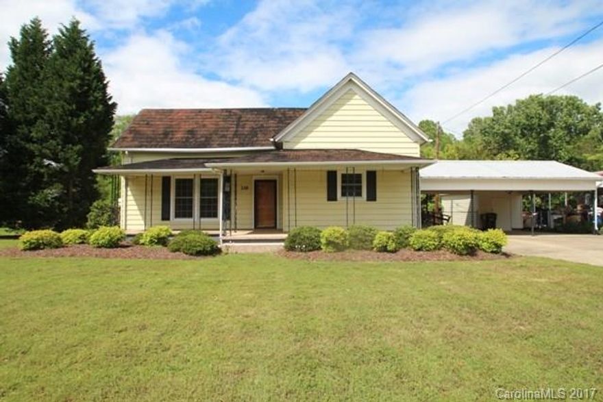 Spacious home within walking distance of school. Spacious family room with gas insert. All rooms are good size. Eat in kitchen. Two car carport. Fenced backyard and two storage building. Covered front porch. Enclosed back porch. Minutes to I85. Being sold as is.