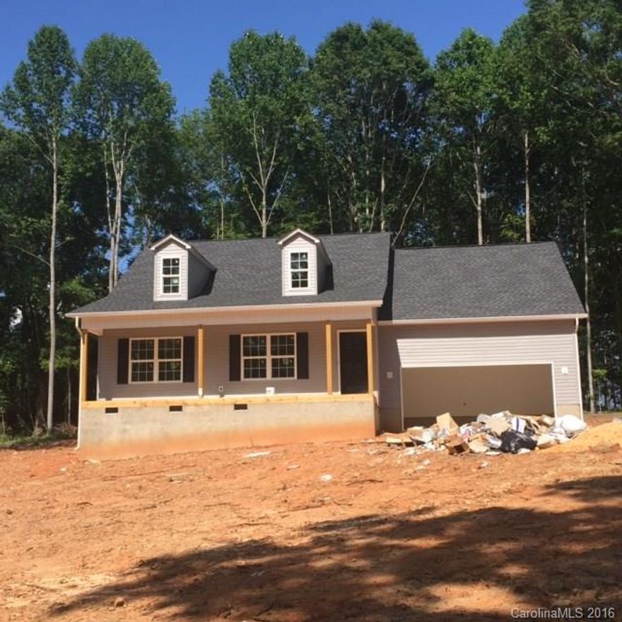 New Construction!! 3 Bedroom 2 Bath home on 1+/- acres.  Granite Counter tops, Hardwood flooring in Living area. Covered front and rear porches, 2 car garage