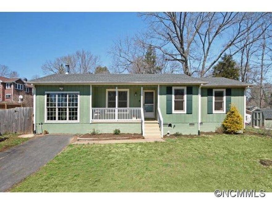 Prime location in the heart of West Asheville. Quick walk to all the trendy restaurants, shops, and music venues on Haywood Rd. Across the street from the West Asheville park and playground.  Wonderful family home with tree house, fenced back yard and large deck for entertaining. Spread out in the spacious great room off living room with wood burning stove. Peak of the mountains from front porch. 1 year Home Warranty. Call broker for a showing.