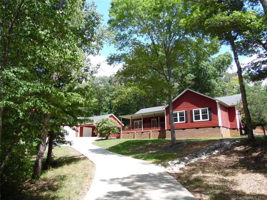 Country quiet awaits in this lovely 3 BR/2 BA home tucked among the trees! Move in ready featuring new carpet, new appliances & more. Enjoy the outdoors from the sprawling front & rear porches or host a gathering in the 3 car det garage (currently converted for entertaining). Gorgeous interior features spacious kitchen w/extensive cabinetry & private master retreat. A rare find! Strongly encouraged that offers include proof of funds/pre-approval & is required for seller's final acceptance.