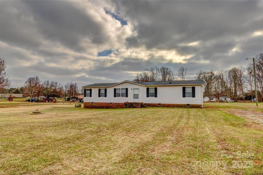 This spacious home has four bedrooms and two full baths.  This is a split-bedroom plan that adds privacy for the primary bedroom.  The open floor plan has a living room and a den.  The lot is 3/4 acres, and the rear yard features a 12 x 15 deck.  The seller is offering an Old Republic Home Warranty.