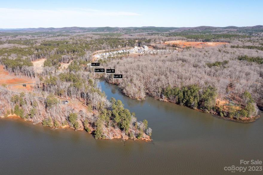 Part of the newly subdivided portion of Swift Island Plantation on Lake Tillery, Lot 8 is over 1.87 acres with more than 180 feet of shoreline. The views are beautiful and the water depth is great. Hardwoods are abundant and the subdivision is serviced by county water / city sewer along with underground utilities. Swift Island Plantation is a gated community with an established HOA. Current Duke Energy guidelines show this property qualifies for a lease which allows for a boathouse and bulkhead. This is to be confirmed by the buyer with Duke Energy. Swift Island Plantation website is www.SIPHOA.com for more info.