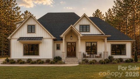 Photo of 111 Rutledge Road, Mount Holly, NC 28120 (MLS # 4385363)