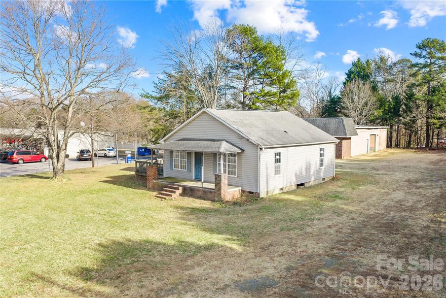 Amazing opportunity to own property located on highly traveled Charlotte Highway in Mooresville!  Offering excellent visibility and convenient access to I-77, downtown Mooresville, and surrounding Lake Norman areas.  Situated on approximately .45 acres and presents a very unique opportunity for commercial use, investment, or potential residential use (subject to zoning and approval by the Town of Mooresville).  Property offers large garage and ample parking.  Ideal for buyers seeking a high-traffic location with flexibility and future potential.