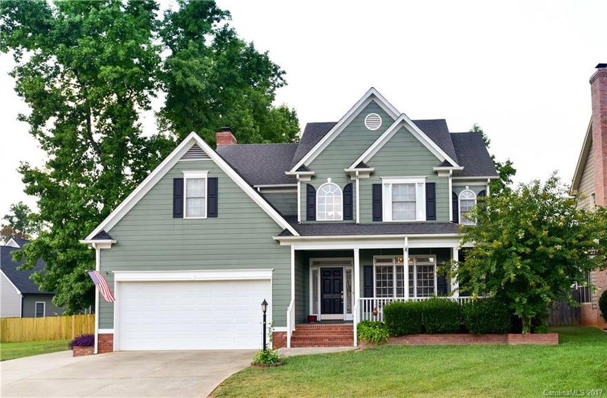 Remarkable 3 bedroom home available in Ashley Park! Crown molding and hdwds thru-out main floor. Elegant frml dining rm w/ chair rail molding & wainscoting. Spacious living rm hosts brick fireplace & large windows allow ample natural light. Master bdrm boasts tray ceiling. Generous bonus rm on second floor that could be used as fourth bedroom. Huge back deck overlooks large, level, fenced in yard. Attached & detached garages allow for separate parking & workshop areas. Tons of storage in attic!