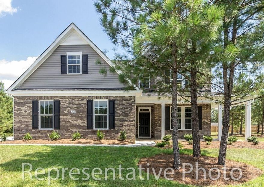 The covered front porch leads you into the foyer which opens into the family room and kitchen w/ nook. The master suite is also downstairs and features a master bath with a large walk in closet and dual separate vanities. A formal dining room and half bath complete the first floor. The 2nd floor features 4 bedrooms, a rec room and the laundry room.  This plan can be built with an optional flex/storage area upstairs.