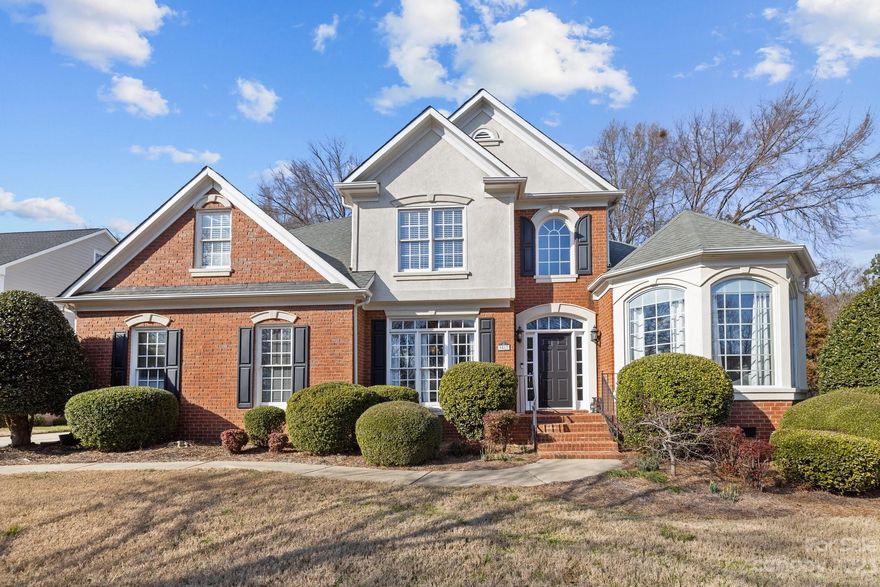 Price Improvement!!  Nestled in a convenient location, this elegant four-bedroom, 2.5-bathroom home offers a modern blend of comfort and functionality. Featuring a primary bedroom on the main level with updated primary bathroom with large walk-in closet, and versatile office catering to contemporary living needs. With abundant natural light, vaulting ceilings and charming exterior accents including brick, stucco, and siding, the home exudes curb appeal. Enjoy peace of mind with a partially encapsulated crawlspace, enhancing efficiency and maintenance. Relish outdoor living in the serene ambiance of a large screened-in porch, with a flat fenced in back yard perfect for year-round enjoyment. This property combines style, practicality, and a sought-after location close to Birkdale Village, entertainment and dining.