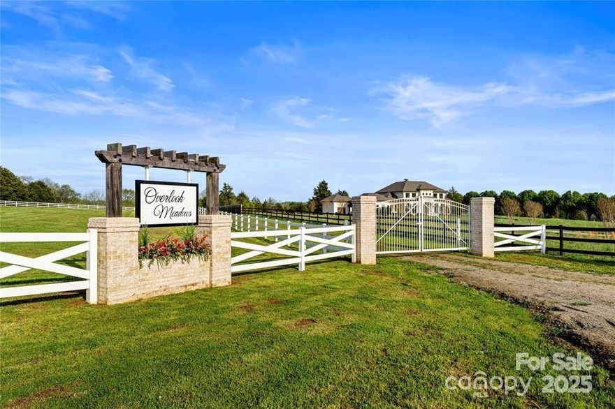 Experience the perfect balance of privacy, space, and convenience at Overlook Meadows, a private gated enclave just minutes from downtown Davidson and Mooresville, and only 30 minutes from Charlotte. This 10.929-acre parcel (Lot 3) offers an exceptional setting for a custom estate, refined retreat, or premier equestrian property.

The expansive acreage features open fields and gently rolling terrain, ideal for creating pastures, riding arenas, and barn facilities while still allowing ample space for your dream home. With a non-expiring recorded 5-bedroom septic permit and buried electrical service already in place, the property is thoughtfully prepared for your vision.


Nestled across both Iredell and Rowan Counties—with the designated home site in the Iredell school district—this location combines serene countryside living with close proximity to modern conveniences. Whether you envision a private equestrian haven or a timeless estate surrounded by nature, Overlook Meadows provides the perfect canvas to bring your dream lifestyle to life.