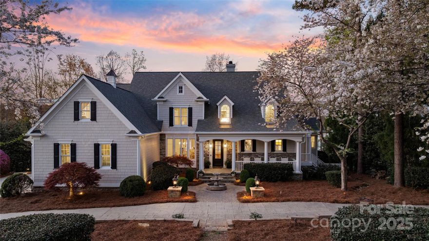 “In my mind I’m gone to Carolina”….here’s your opportunity to own in one of the most sought after locations in Lake Norman! Enjoy waking up to spectacular panoramic lake views in the most exquisite home thoughtfully designed to embrace the water, natural light & outdoors from every room. This home rests on a private .85 acre lot with over 190' of pristine Lake Norman shoreline. Inside, the home exudes coastal comfort & luxury with designer finishes, an elevator, custom mill work, expansive windows & endless lake views. Enjoy your private balcony off your main level primary suite plus 3 bedrooms with en-suites in the upper level plus an office & bonus room w/ bunk beds. The lake level is an entertainers dream with a bar, living room, new bedroom & incredible indoor/outdoor living. Enjoy the lake life on the sandy shore, pool/spa & the gorgeous private dock. Just a short distance to everything The Point & Trump National Golf Club has to offer makes this property truly something special!