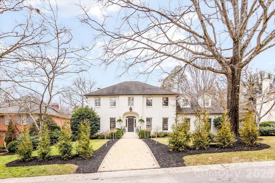 Stunning six-bedroom, 4½-bath home in desirable and established Winding Brook, tucked away on a quiet cul-de-sac with no through traffic. Featuring a private pool and an exceptional layout designed for comfortable everyday living and effortless entertaining. Enjoy the privacy, convenience, and true sense of community — a place where kids ride bikes in the street and neighbors feel like friends. Thoroughly renovated and beautifully maintained, this residence blends timeless elegance with modern comfort in every space, complemented by high-end designer chandeliers and luxury-grade fixtures throughout. The bright, open-concept Kitchen is a showstopper, featuring custom cabinetry, quartzite countertops, double large center islands, walk-in pantry, and Wolf, Sub-zero and Miele appliances. The Kitchen flows seamlessly into the Great Room and Sunroom with hardwood floors throughout the main level, creating the perfect layout for both everyday living and entertaining. The wall of windows overlooking the private backyard and pool wash the main living area with natural light and creates a space you never want to leave. The spacious Great Room has a gas fireplace with custom mantle, and opens through French doors into the spacious, light-filled drawing room. Across the Foyer, the Music Room could also be used as a formal Dining Room opening to the Kitchen. The Bonus Room on the main level features built-ins and large walk-in closet for ample storage and boasts a gas fireplace. The Laundry Room is exceptionally large and well-appointed with custom cabinets and lockers that are both beautiful and functional. Upstairs, the spacious Primary suite includes a luxurious bathroom and two grand-scale walk-in dressing rooms.  Secondary bedrooms with hardwood floors and large closets with built in desks, share a modern full bathroom. Additional bedrooms are both generously sized and share a fresh bath with a shower tub combination. On the lowest level is the sixth bedroom that could be used as an exercise room with attached inviting and spacious full bathroom. The downstairs living area has the third gas fireplace and is spacious and walks out to the beautiful covered loggia. The private backyard oasis features a sparkling heated  in-ground liner pool, expansive patio space, and multiple areas for lounging and dining. The covered terrace provides year-round enjoyment and effortless indoor-outdoor living. Side load two car garage with storage room caps off this exquisite home overflowing with charm, elegance and functionality.