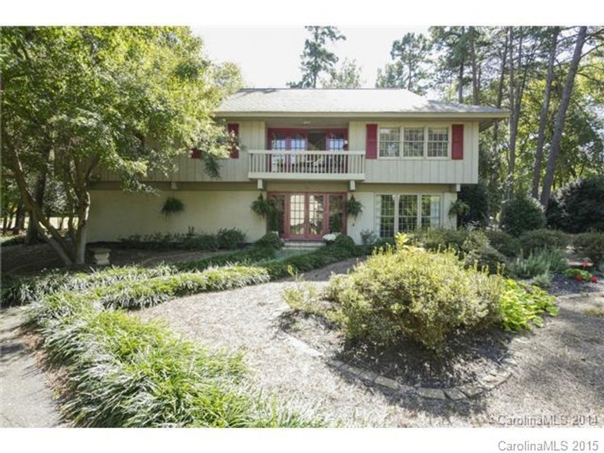 Commanding 2 golf holes at River Hills community | Situated on quiet cul-de-sac | Gourmet kitchen w/ oversized island & tons of space to work. Completely remodeled Master bdrm is open with sitting area/studio for painting, reading | Oversized garage/workspace | Lower level could be mother-in-law suite/teen suite | All this & award winning Clover schools