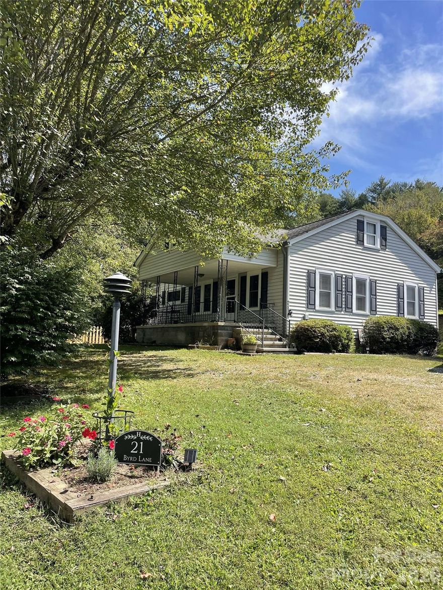 New Price, Subdivided, and ready to sell. This beautifully updated homestead offers an ideal full-time or seasonal residence with land and a versatile workshop. The farmhouse has been recently remodeled and may be sold furnished. Original hardwood floors highlight the home’s character and solid construction. The upstairs attic provides potential for additional living space and a second bathroom. Set on 1.3 unrestricted acres, the property features mature landscaping and a beautiful setting. The detached shop can include its own driveway and an approved two-bedroom septic system, offering the opportunity to convert the space into a studio apartment or to add an additional home site or mobile home. Conveniently located just two miles from downtown Brevard, the property offers easy access with no winding roads and close proximity to shopping, healthcare, the airport, and abundant outdoor activities. This unique property provides flexibility for multi-generational living or an excellent passive-income investment opportunity. This property was recently listed as Pending. The sale was canceled with no fault to seller or property. The property has recently been subdivided to allow for the price adjustment. The home and property is listed as Flood Zone X, (NOT IN FLOOD ZONE) in Transylvania County and did not have any damage regarding Hurricane Helene or other storms. Additional property available.