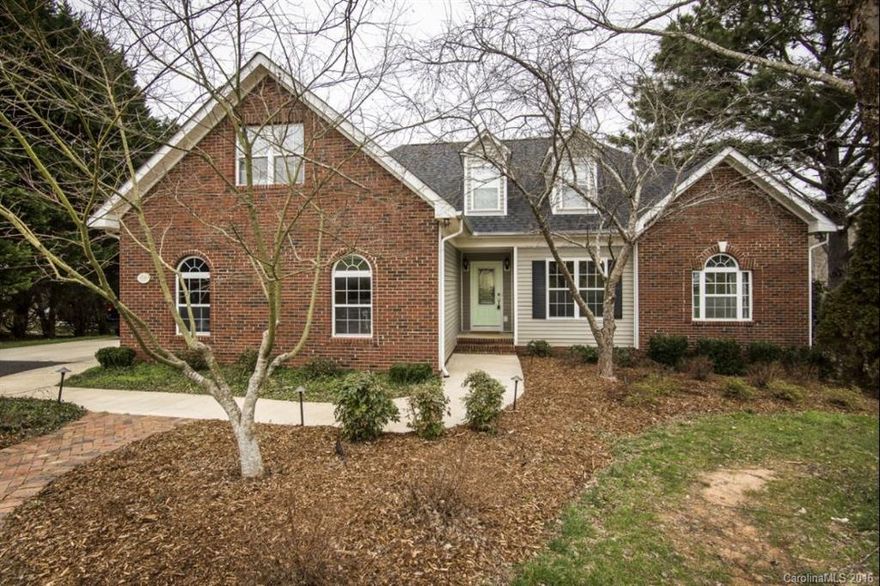 This listing is gorgeous! Beautiful home located in Indian Land just minutes from Ballantyne. This spacious 4 bed, 3 full bath is situated on 1.29 acres nestled in cul-de-sac. Large private backyard feels like 3 acres! This home is move in ready! Improvements include hardwood floors, updated bathrooms, quartz countertops, and glass mosaic tile backsplash in the kitchen. This home includes a charming brick patio that is the perfect spot for breakfast in the morning sun, or a cozy fire by night!