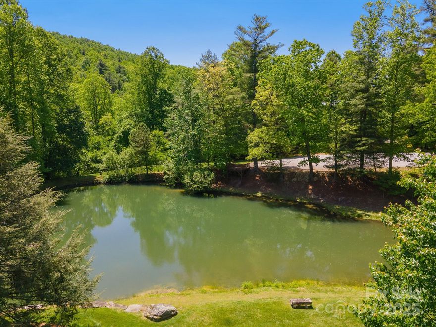 Welcome to Laurel Park! This premium lot, nestled within an exclusive gated community, invites you to indulge in natural beauty, privacy, & convenience.

Key Features That Set Lot Apart:
Immerse in the tranquility of your private oasis with no neighbors behind you. Revel in the calming sounds of a pond with captivating waterfalls, creating an idyllic backdrop for your dream home. 

Easy Accessibility, All-Year-Round: Say farewell to winter worries! This premium parcel boasts easy access w/out the inconvenience of steep slopes. 

Proximity to Downtown Hendersonville: A mere few miles away from the vibrant heart of downtown Hendersonville, enjoy the perfect balance of privacy & city conveniences. Your retreat is just moments away from the buzz of the city. Venture to the west, & you'll discover the renowned Brevard area, celebrated for its outdoor activities and a backdrop for numerous movies. To the northwest lies the vibrant city of Asheville, beckoning with its cultural charm.