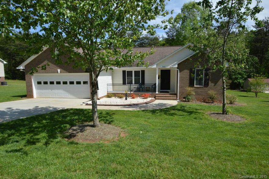 Country Living at it's Finest.  Charming 3 Bedroom, 2 Bath Ranch with Rocking Chair Front Porch.  Attached 2-Car Garage.  Open Floor Plan, Move-in Ready - Meticulously Maintained.  Large Flat Lot with Wonderful Outdoor Deck and Screened Porch Area - Perfect for Relaxing or Entertaining.  One Year Home Warranty Provided - Serenity of the Country - yet less than 1/2 hour to Mooresville / Lake Norman.  Welcome Home!