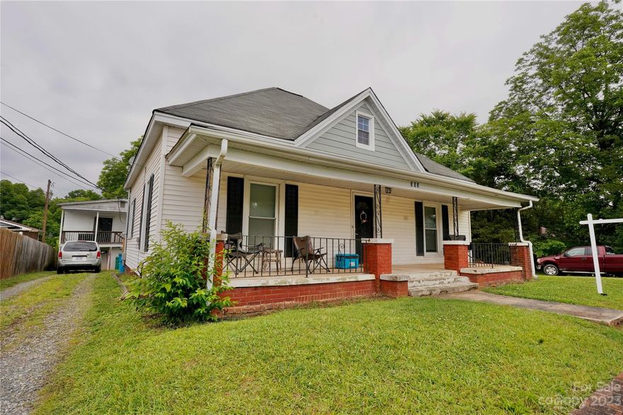 This vintage bungalow style home has the wonderful high ceilings & an 11 min walk to DT Belmont per Google maps. 2 bedrooms on the main level with large living & dining areas as well as a huge laundry/utility room. Lovely stairway to the second level where there are 2 bedrooms which share a separate sizable finished but unheated closet located in the hall - & a half bath. One bedroom has a dormer & window; the other has a low skylight - both have abundant charm. The large back deck is conveniently accessed from the laundry/utility room. One of the 2 main level baths has a charming footed tub & is located just off the finished, unheated laundry room for convenient access. Many updates including windows & 2nd level expansion into attic; seller states most updates unpermitted. Separate apt- 1 BR/1 full Bath needs work; structural stability unknown so be mindful when viewing; HVAC is gas with window unit(s) for AC. Quick access to I-85 and all the beauty & convenience of historic Belmont!