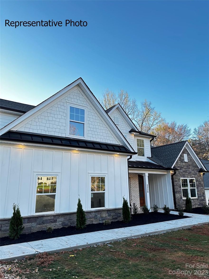 Discover this Matthews Special, a 4-bedroom, 3.5-bath SmartHome with a loft, designed by Dosan Builders. This eco-conscious residence combines modernity with timeless charm, featuring cathedral-height ceilings upon entry, a family room with a gas fireplace and expansive UV-factor windows, and a gourmet kitchen with an island and premium Electrolux appliances. The primary bedroom is located on the main floor, complete with tray ceilings, a dual vanity ensuite, and a garden tub, as well as a walk-in closet. Upstairs, 3 additional bedrooms and a loft await, complemented by two full bathrooms. The main-floor laundry room includes a sink for added convenience. This property also offers a generous lot with a finished garage.  Construction is scheduled to conclude by the end of March.  The front yard will have a U-shaped driveway and the dining room can be closed in as a finished office. Finishes can be selected up until 2/1. Ask about $10k in closing.