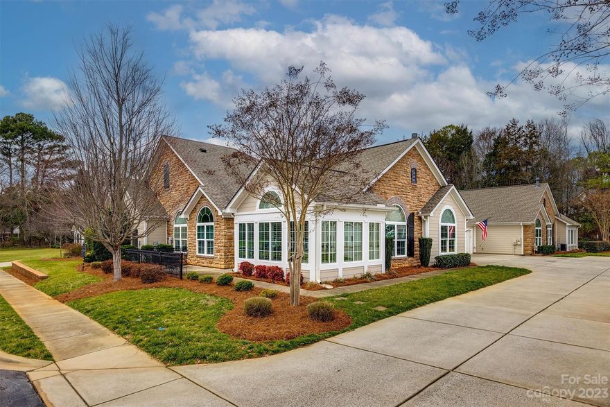 Experience ease of ownership & worry-free maintenance in this peaceful 55+ community close to the heart of town. If you enjoy entertaining, you’ll love the spacious, open living room & dining area. Kitchen offers tons of cabinets, granite countertops, gas stove, eat-in island, pantry & beautiful built-in hutch. Natural light streams in every room, easily adjusted with the custom shutters as you desire. You’ll especially love the sunroom, just off the main living area or enjoy the Carolina sunshine from your patio. Primary suite provides a large bedroom, walk-in closet, and spacious bathroom with walk-in shower. The unique floor plan offers a separate office in addition to the two spacious bedrooms. More perks include a large laundry room, abundant storage, and a two-car attached garage with extra parking spaces. The community amenities include club house, pool, & fitness area. You won’t want to miss the lower cost of living in SC, while being a short drive to nearby Charlotte, NC.