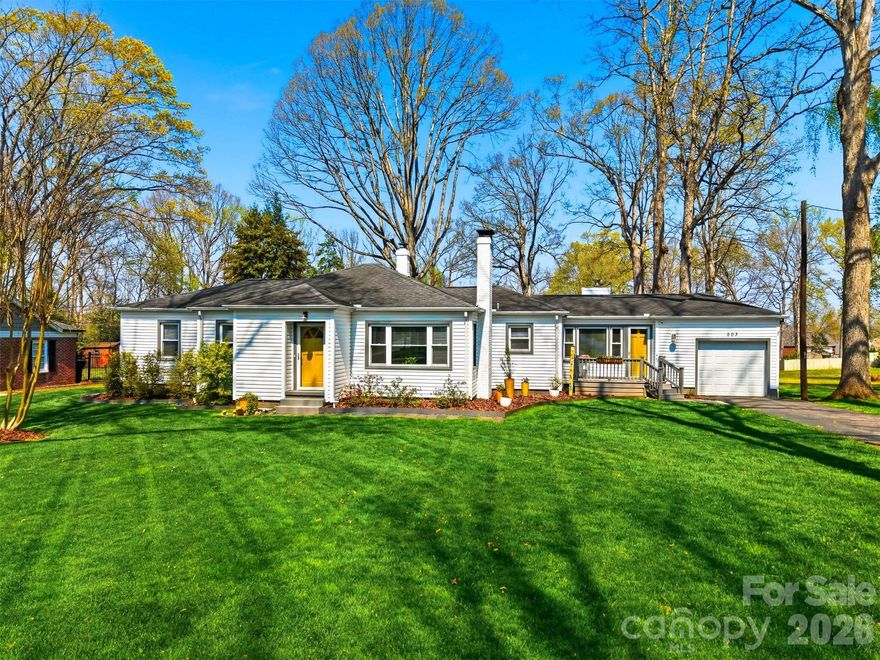 Charming mid-century ranch with modern updates and incredible outdoor space.  This 2-bedroom, 2-bath home offers over 1600 sq ft and includes a versatile bonus room that could function as a 3rd bedroom, office, or flex space.  
Inside, you'll find an updated kitchen with granite counter tops, updated bathrooms, beautiful hardwood floors, and character you'd expect from a 1950's home.  The layout offers a unique and private primary bedroom setup, tucked beyond the bonus room-perfect for a quiet retreat.  
Step outside and fall in love with the expansive 0.82 acre lot featuring a huge fenced in backyard and putting green, ideal for entertaining, pets or play.  A large, detached 20'x24' shed provides endless potential for a workshop, storage or the perfect man cave or she shed.  
Kitchen, bathrooms, HVAC, water heater and windows all updated in 2022. Plumbing updated in 2023, as well as new vapor barrier and insulation in crawl space. 
Location is close to I-40 and shopping but private enough to give you the space and privacy you need!