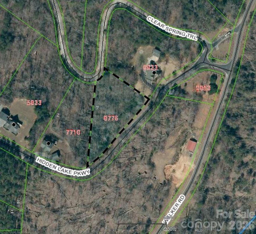 Located in Hidden Lake subdivision  restricted Home lots  located just inside the gated entrance.  Lot is 1.66 acres and has two road entrances to  lot  off Clear Springs Trail  and Hidden lake parkway see  Map  Has Private Lake and swimming Pool for Home owners to use