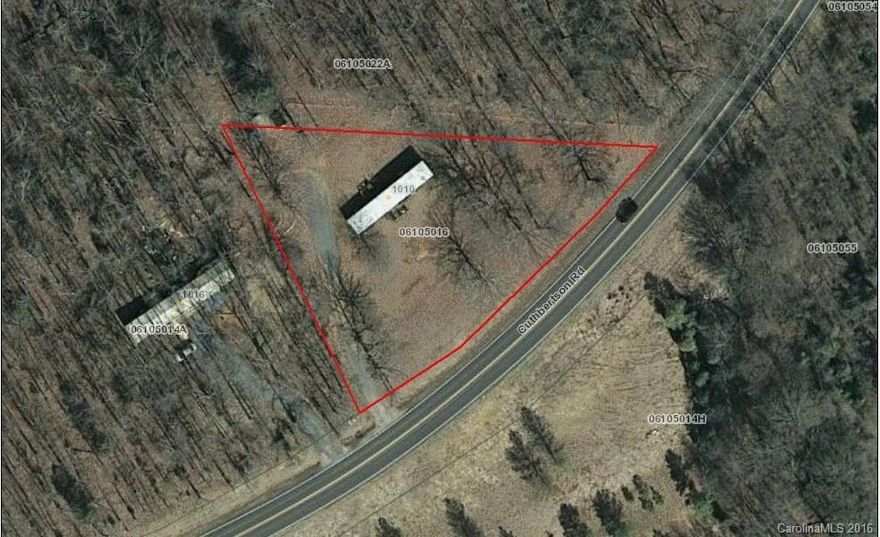 Wonderfully located in the Village of Wesley Chapel .  Convenient to shopping, restaurants and I-485.  Home is in need of some repairs and is being offered "as is".  Well and septic is on site, with county water available at road.  Value is primarily in land and location.
