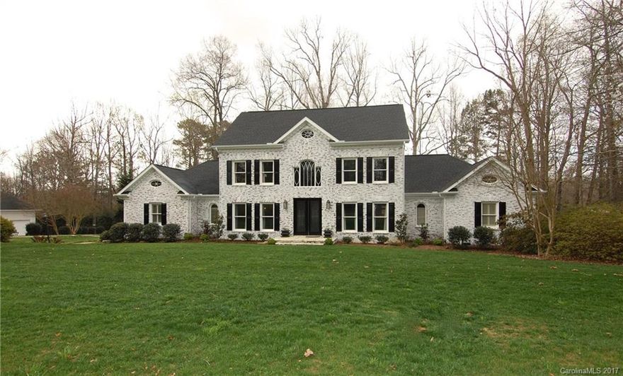 Gorgeous southern style estate! This wonderful home was recently renovated. Rich hardwoods throughout the main living area. Formal living & dining rooms. Living room w/ built ins & wet bar. Chefs kitchen boasts flowing granite countertops, beautiful cabinetry, SS appliances, & intricate tile backsplash. Master on the main level w/ luxurious tray ceiling. Master bath offers a relaxing jetted tub, separate shower, & dual vanities. Spacious bedrooms all w/ full bathrooms. Amazing screened-in Porch!