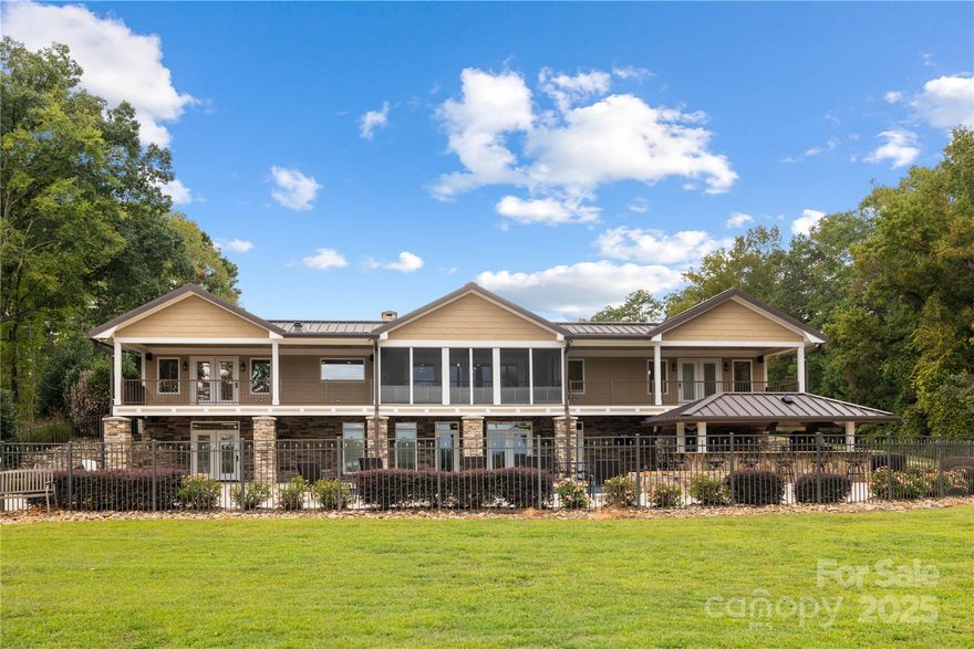 Nestled across from a golf course and sitting on nearly 13 acres, this breathtaking 5-bedroom, 6.5-bathroom home offers the perfect blend of luxury living and outdoor recreation. With 500 feet of prime lake frontage on Lake Tillery, a stocked pond, and private sports courts, this property is an entertainer’s dream.

Home Features:

Spacious Layout: Offering over 6,000 sq. ft. of living space, this home includes 5 bedrooms and 6.5 bathrooms. The expansive primary suite is conveniently located on the main floor for ultimate privacy and easy access to the outdoor amenities.

Two Full Kitchens: The home features two fully-equipped kitchens—one on the main floor and another in the basement—perfect for entertaining or creating a separate living area for family or guests.

Lakefront Access & Dock: Enjoy 500 feet of stunning lake frontage on Lake Tillery, complete with a private dock for 2 boats and 4 jet skis. The entertainment dock, featuring a diving board and fish feeder, is perfect for unwinding or fishing—Sellers have even caught a 34-lb catfish right from the pier!

Private Sports Courts: Whether you're into tennis, basketball, pickleball, or baseball, this property has it all. Enjoy your own private courts, along with a professional-grade batting cage for baseball fans.

Resort-Style Pool and Spa: The backyard oasis includes a heated pool and hot tub that spills into the pool, offering year-round enjoyment. An outdoor kitchen completes the space, making it perfect for outdoor cooking and entertaining.

Finished Basement Retreat: The fully finished basement offers 2 additional bedrooms, a second kitchen, a spacious living area, and a cozy game room with a fireplace—ideal for guests, family, or a private retreat.

Extra Amenities: A fully equipped gym and a drive-through garage provide added convenience, while the expansive 12.87-acre property offers ample space for privacy and recreation.

Additional Highlights:

Privacy & Space: With 12.87 acres of land, you’ll enjoy the freedom to roam, plus plenty of space for outdoor activities, all while being surrounded by nature.

Prime Location: Though it feels like a secluded getaway, the estate is just across from a golf course and conveniently located near shopping, dining, and other local amenities.

This property has everything you need—luxury, comfort, and endless opportunities for recreation, relaxation, and entertaining. Don’t miss your chance to own this one-of-a-kind estate!

Professional Photos will be updated by 10/9/2025