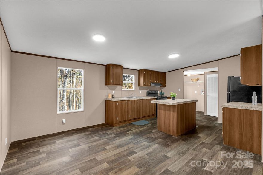 Seeking the Serenity that your own private acreage brings?  Find it here! Come and see the beautiful 5 acres on a cul-de-sac, sit on the large deck and hear the sounds of nature all around.  Privacy with convenience, only 8 minutes to York, 12 mins to Clover, and convenient access to I85.  This charming 3 bedroom, 2 bath home has a large back deck and both cleared and wooded areas to enjoy the natural beauty of your homestead.  Open concept living, dining, kitchen.  This right-sized split plan has primary suite opposite of the other two bedrooms and bath.  Peace and Tranquility are waiting for you, come see it today.