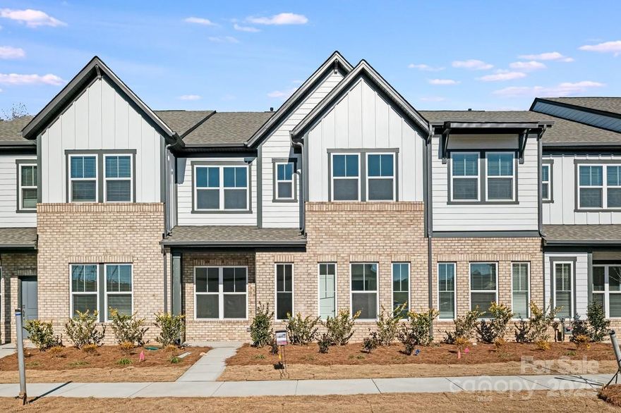 MLS#4201838 Ready Now! The Telluride at Ridge at Sugar Creek is a 26’-wide, two-story townhome in Indian Land, SC, designed for comfort and versatility. The ground floor features a rear 2-car garage leading to a practical valet and half bath, transitioning into an open-concept kitchen, casual dining area, and a welcoming gathering room. A main-floor guest suite with a walk-in closet adds convenience and flexibility. Upstairs, a spacious study offers the perfect spot for a home office or gym, while the deluxe owner’s suite, two additional bedrooms, a full bath, and a conveniently located laundry room provide ample living space for modern lifestyles. Structural options added include: tray ceiling at owner's suite and study.