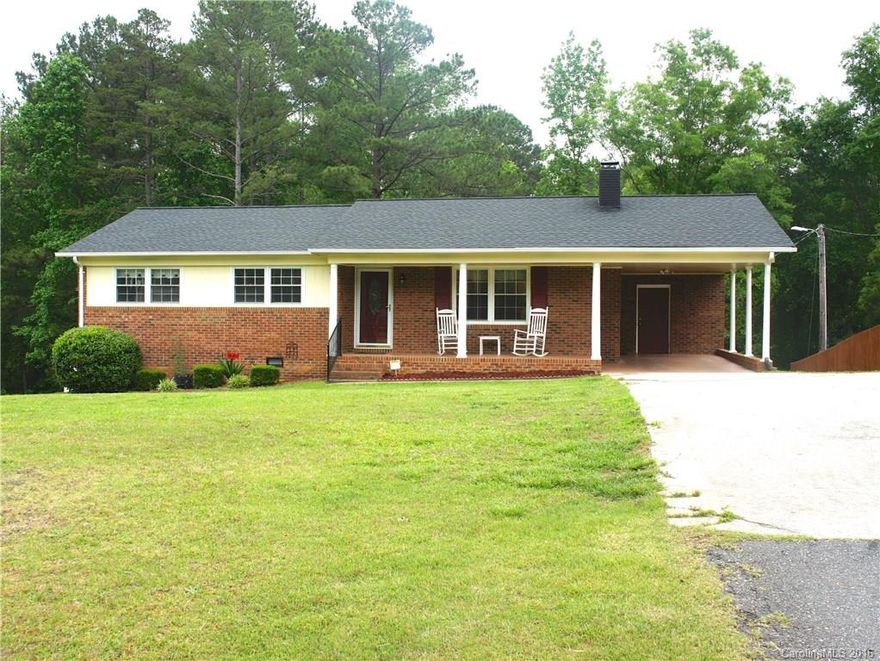 Move right into this beautiful brick home located on .98 acres. Includes a 3 BR, updated 1.5 BA, an open floor plan with a spacious kitchen. Great storage/sizable laundry and utility room for all of the common household needs. Enjoy cozy nights by the beautiful pond in your own backyard or perhaps some rest and relaxation in your outdoor screened deck. Large/fenced Backyard great for entertaining. Owner takes pride of their home and it shows. New Roof installed 2013. No HOA and Low SC taxes!