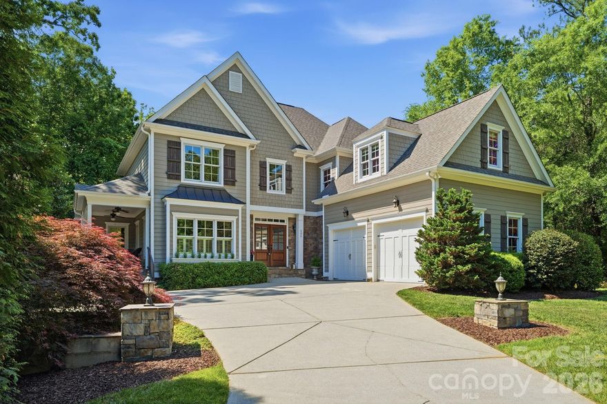 235 Grey Road offers a rare opportunity to own one of the few true 5-bedroom homes in downtown Davidson. Situated on an exceptional and private .9-acre lot backing directly to Davidson College, this custom-built residence combines timeless craftsmanship, expansive living spaces, and an unbeatable walkable location just moments from downtown Davidson’s shops, restaurants, and parks.

Originally constructed by a renowned local builder as his personal residence, the home showcases thoughtful design and quality throughout. Featuring 5 bedrooms, 4.5 baths, and a finished basement with full kitchen and recreation area, the property offers flexible living spaces ideal for both everyday living and entertaining.

The backyard is a true retreat, with a private setting overlooking mature landscaping, a salt-water pool, fire pit, and in-ground trampoline—creating a rare outdoor experience in the heart of Davidson. With nearly an acre of land, exceptional privacy, and a highly sought-after location, 235 Grey Road represents a unique opportunity to own one of downtown Davidson’s premier family homes.