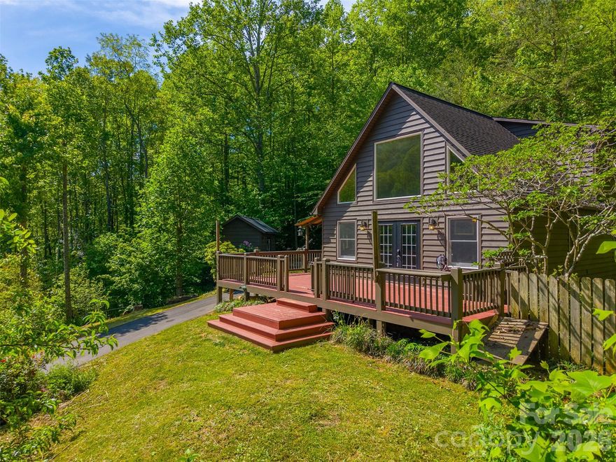 Tucked away in the heart of the mountains, 110 Wyoming Drive offers the perfect blend of charm, character, and modern comfort. This 3-bedroom, 2 bath home features inviting A-frame vibes with stylish updates throughout, creating a warm and unique living space.
Step outside and enjoy your own private retreat with a small creek at the bottom of the property, an ideal spot to create a peaceful sitting area and unwind. The property also offers a great space for a small garden, beautifully maintained landscaping, and an outdoor shed perfect for hobbies or additional storage.
Conveniently located just minutes from Dillsboro and Sylva, you get the best of both worlds, quiet mountain living with easy access to local shops, dining, and amenities. Whether you are looking for a full-time residence, vacation home, or investment opportunity, this property is full of potential and mountain charm.