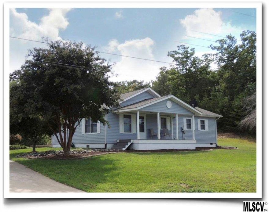 Wonderful 3 bedroom, 1 bath bungalow on 4.25 acres in Connelly Springs. This home is just brimming with charm, featuring a large eat-in kitchen, some stainless appliances and lots of counter/cabinet space. The living room and bedrooms have wonderful hardwood floors and a fresh coat of paint.  The bathroom has new flooring, efficient layout and new paint. There is also a large laundry room on the main level.  Outside this home features a double carport as well as a large 1 car garage that would make a great workshop. The land on this property has a rolling terrain with lots of flat areas and is mostly cleared. The new buyer will just love evenings on the front porch looking at the mountains in the distance and the setting sun. Check out this great property today.