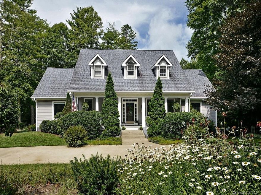 Inviting home in Biltmore park offers great gathering spaces, a main level master with spa-like new bath and gorgeous private deck. 2nd master bedroom upstairs. Granite, island, & subway tile in kitchen. New oak floors on main level. Ample storage. French doors to deck make for easy living. Hot tub included. Separate apt (adds 640sq.ft) and 3-car garage, both rare in Biltmore Park. Circular driveway, and beautifully landscaped lot.Short distance to K-12 schools and vibrant Town Square amenities.