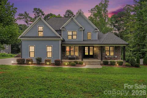 Photo of 496 Bellingshire Drive, Mt Ulla, NC 28125 (MLS # 4417226)