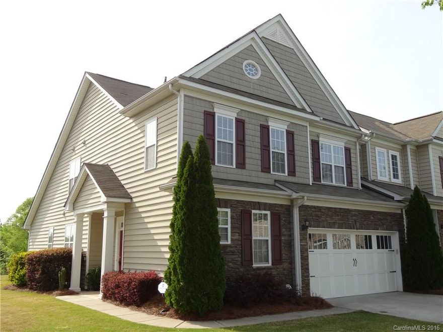 Just listed - don't miss out on this move-in-ready, sought after Stone Creek Ranch end unit with two master suites and more!  Immaculate! New granite countertops, carpet upstairs. 42" cabinetry, volume ceilings, 2 car garage. Patio overlooks lush lawn and wide natural common area for privacy (can fence for hot tub).   Exterior maintained by HOA, so spend your free time at the pool, schools, recreation and greenways, Ballantyne restaurants and shopping. Easy access from I-485, Providence Rd.