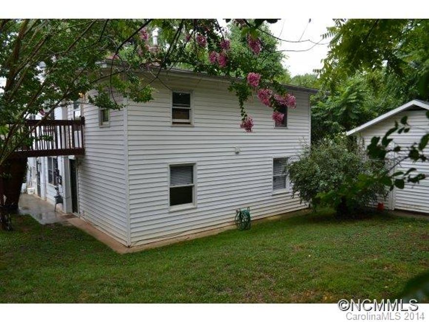 Triplex in excellent location, walkable to heart of West Asheville.  Community Business zoning, owner pays utilities, 412 sf unfinished upstairs, easy to add to existing 2BR apartment.  1535 sf shed w/ power & skylight. On site laundry. Drive by first, then contact listing agent w/ 24 hour advanced notice to show (tenants)