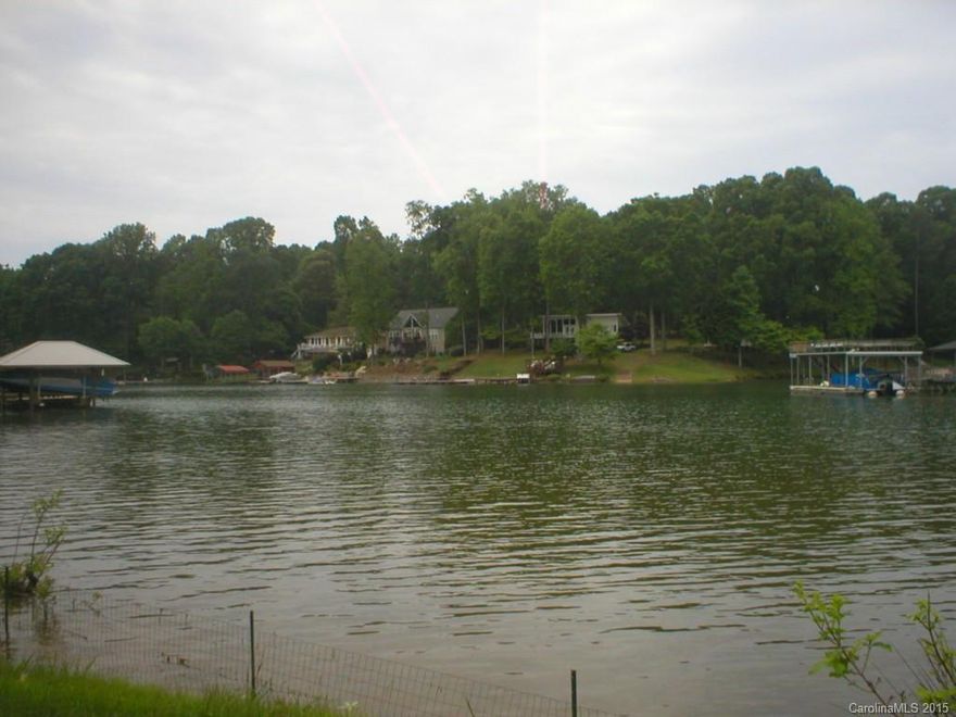 Back on the market! Beautiful waterfront lot ideally sloped for a walk out basement home. Very nice view across an open span of water and southwest facing for gorgeous sunsets. Deep water for a dock. Already perked for a 3 bedroom home. This is one of the fast disappearing waterfront lots that has a nice, open view with good, deep water. Lots of privacy but conveniently located within minutes of all amenities, shopping, restaurants, interstates and more. Don't miss this one.