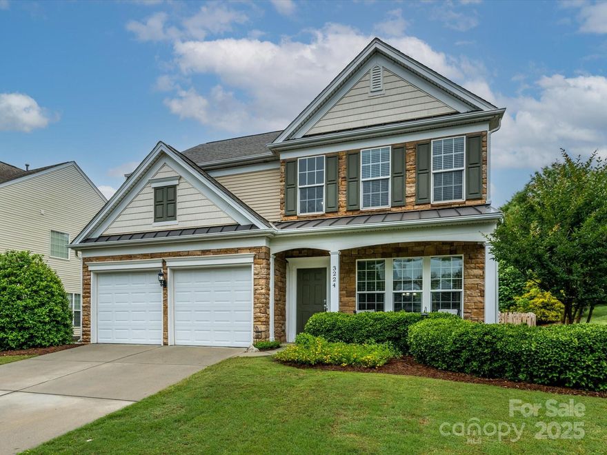 Beautiful previous MODEL HOME with significant updates.  NEW roof 2021. NEW LVP flooring on main. New HVAC 2022. NEW water heater 2018. NEW kitchen backsplash. UPDATED kitchen cabinets. Many areas FRESHLY painted. Landscaping UPDATED & IMPROVED. Backyard FENCE added.  This home has 4 Bedrooms and 2.5 Baths with a great floorplan! It has Corian countertops, black appliances, tile in bathrooms and BEAUTIFUL high end LVP floors throughout downstairs! The yard has an Irrigation system and there is an Alarm system.  This previous model home has all the bell's and whistles!  Walk across the street to the pool, clubhouse and playground! And to top it off, the home is close to excellent schools, shopping, and restaurants with quick access to I-485 and uptown Charlotte - with the advantage of SC taxes! WELCOME HOME!