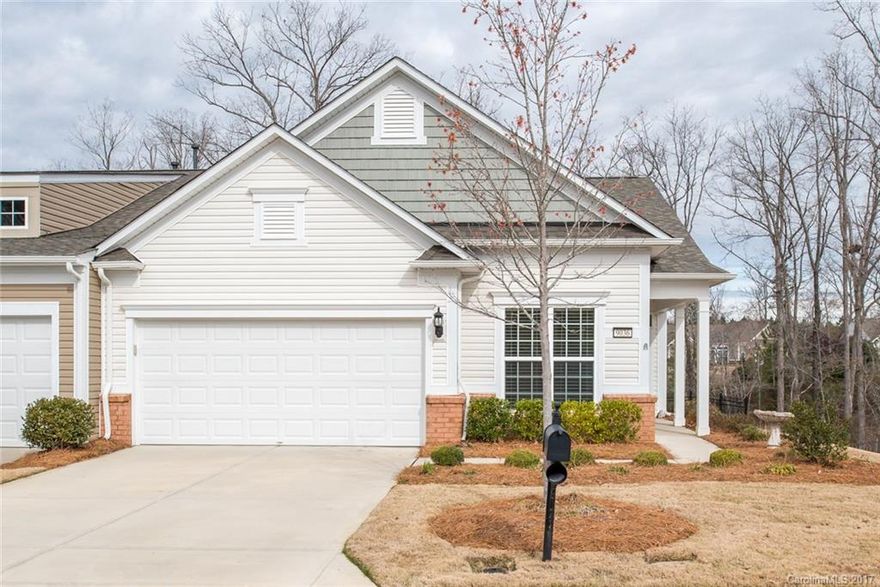 Immaculate Muirfield Villa w/ upgrades galore! Hardwood floors throughout living areas, tile floors in both bathrooms, plus granite counters in the kitchen & bathrooms.  Foyer leads to library & spacious great room w/ great natural light. Kitchen w/ SS gas appliances, antique white cabinets, subway tile backsplash, cabinet pull outs, island, dining nook & pantry. Screened porch w/ privacy partition, private wooded backyard, huge side yard, views of the trail & stream. 55+ active adult community.