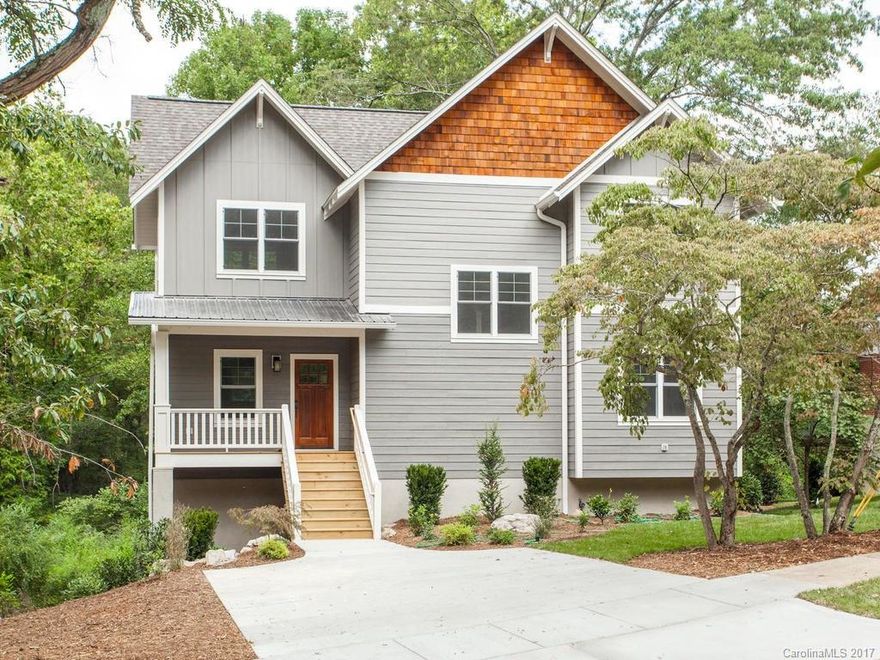 Contemporary craftsman boasting fine finishes and thoughtful details in coveted Malvern Hills. Walkable to the heart of West AVL, yet tucked away overlooking Canie Creek and its popular, unofficial greenway. Top-notch and magazine worthy kitchen flows into wide-open living and dining with floating back porch. Private study on main. Big, bright bedrooms in the trees with stunning luxury bathrooms. Full basement ready for 4th bed, rec room and full-bath. Back yard will be a creekside paradise.