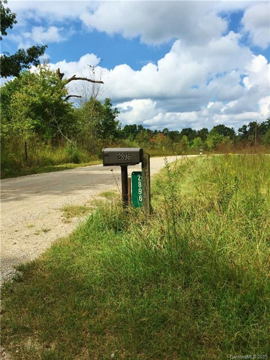 Tired of looking at house after house and you're thinking about building your dream home instead?  Look no further than this little slice of Heaven of 5.1 acres.  Well and septic are already onsite.  Bring  your horses and chickens, too!