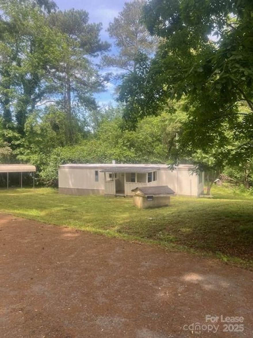 Charming remodeled singlewide available for rent.  Two bedroom and one bathroom.  New flooring and new HVAC.  Large yard with carport at the end of a quiet and private street. A must see!