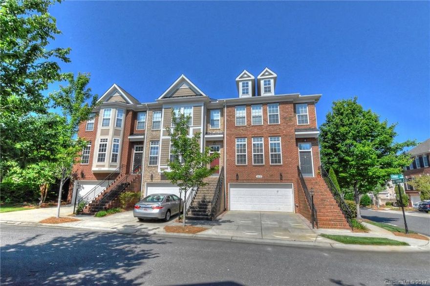 This is it! Beautiful end unit overlooking the pool! Private elevator & gleaming hardwood floors, granite countertops, gas log fireplace, stainless steel appliances & great storage! You’ll love the tiled lower level w/full bath perfect for a rec room, home office or 4th bedroom suite. The light filled open floor plan includes gracious formals, keeping room & designer kitchen.Enjoy the outdoors on the private deck or gated paver patio!The community offers a park, gazebo,pool & secure gated entry.