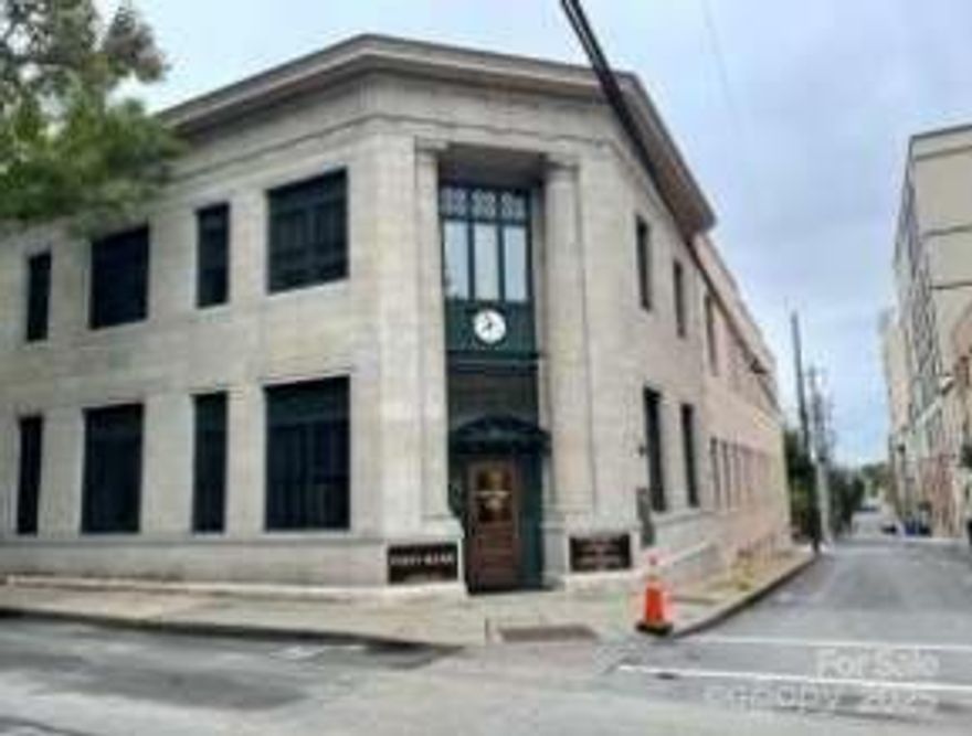 This downtown Asheville space consists of 6 parcels including the Former Bank Building at 11 Church St.  This is a 3 level bank including a 1st Floor that is 8,725/sf, a 2nd Floor that is 8,725/sf and basement space that is 7,765/sf for a total of 25,215/sf building.  With all 6 parcels, there is 0.78/ac directly in downtown Asheville.  There are some parcels that are strictly parking lots, one is a walkway, but all are included in this sale.  Call the broker for parcel options, which are available for consideration.  There is a drive-thru at the main location.